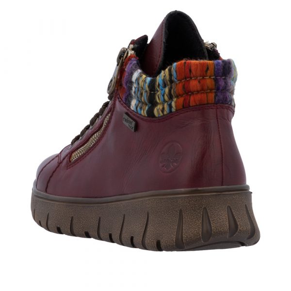 Baskets femme Cuir souple Imperméable Semelle épaisse Chaussant large Empiècement multicolore RIEKER N1305-35 coloris bordeaux. Vue de l'arrière d'une chaussure gauche faisant apparaître la hauteur du talon.
