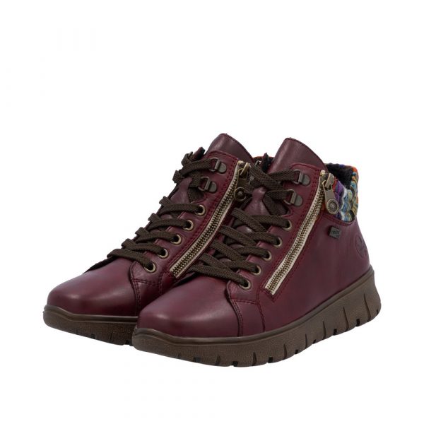 Baskets femme Cuir souple Imperméable Semelle épaisse Chaussant large Empiècement multicolore RIEKER N1305-35 coloris bordeaux. Vue d'ensemble de deux chaussures.