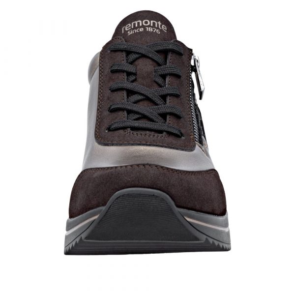Tennis femme Matière stretch Talon compensé Lacet + fermeture éclair REMONTE coloris marron bronze imprimé léopard. Vue d'ensemble de l'avant d'une chaussure gauche.
