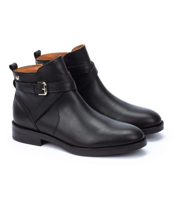 Boot cuir souple femme Talon plat Dessus sans couture Fermeture éclair PIKOLINOS PUERTOLLANO Coloris noir. Vue de biais de l'avant de deux chaussures.