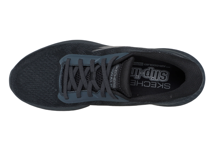 Tennis Maille déperlante Homme Semelle épaisse Système slip-ins Chausse pied intégré SKECHERS coloris noir. Vue de dessus d'une chaussure droite faisant apparaître la semelle intérieure.