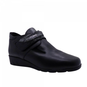 Bottines femme Cuir Doublure textile peluche fermeture velcro Elastiquée côtés Talon compensé Dessus sans couture PEDI GIRL Catogan coloris noir. Vue d'ensemble d'une chaussure droite.