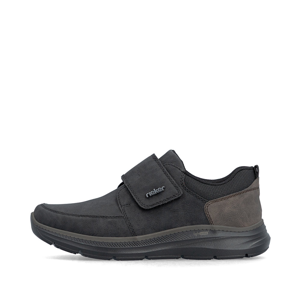 Chaussure basse homme Scratch Semelle souple Sneakers Simili cuir RIEKER B1854 Coloris noir. Vue du côté extérieur d'une tennis gauche montrant la fermeture à velcro.