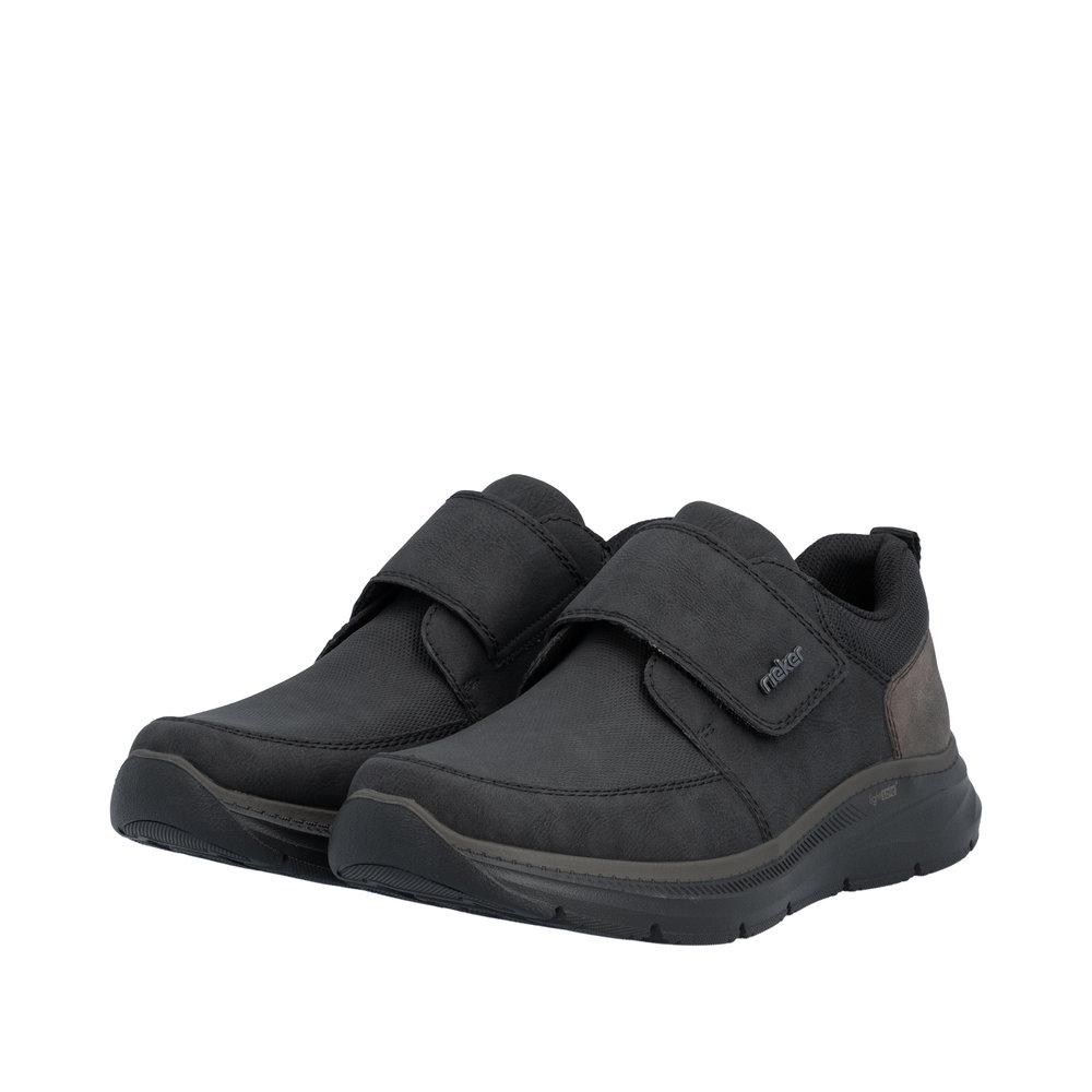 Chaussure basse homme Scratch Semelle souple Sneakers Simili cuir RIEKER B1854 Coloris noir. Vue d'ensemble de deux tennis.