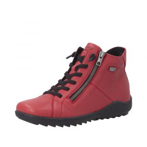 Bottine cuir femme Semelle souple antidérapante Boots dame Imperméable Doublure chaude Lacet élastiqué REMONTE Coloris rouge. Vue de biais d'une chaussure gauche.