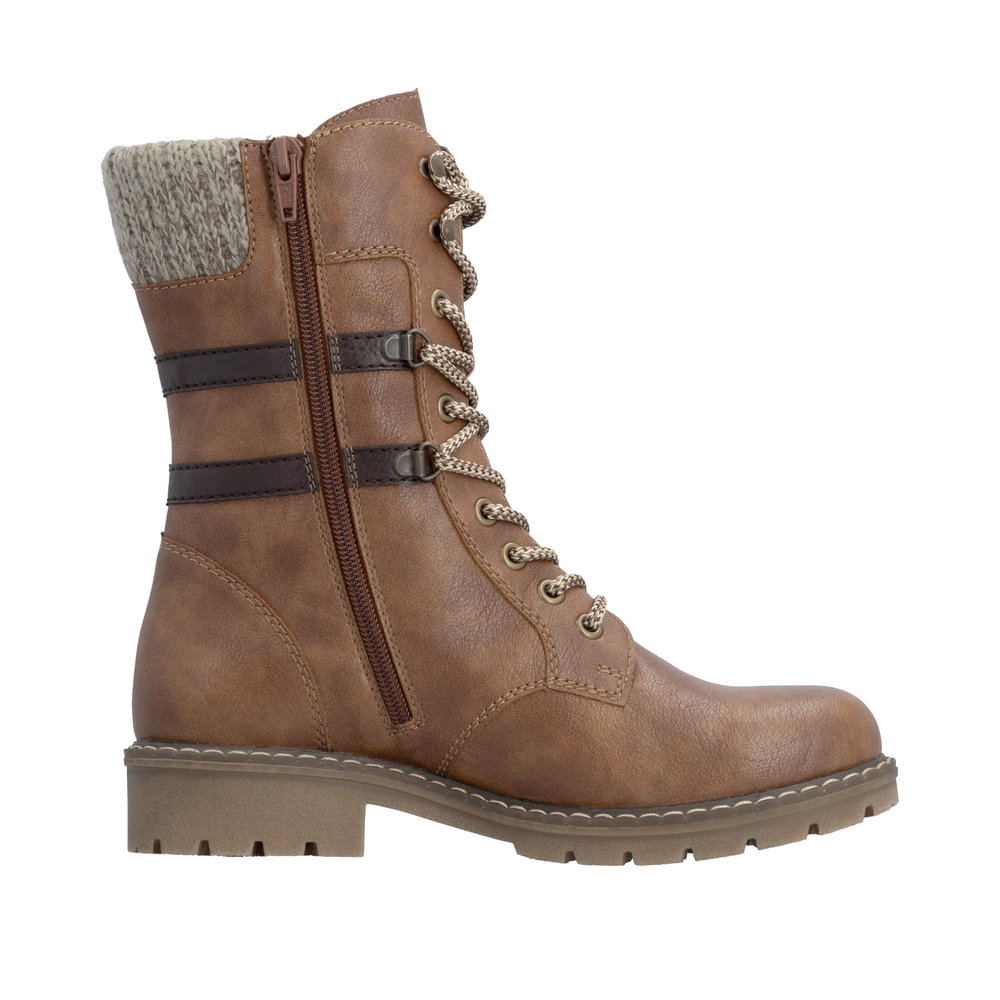 Boots femme Doublure chaude Lacets + zip Bottine dame faux cuir Talon décroché RIEKER Coloris marron camel. Vue du profil intérieur d'une chaussure gauche laissant apparaître le zip intérieur.