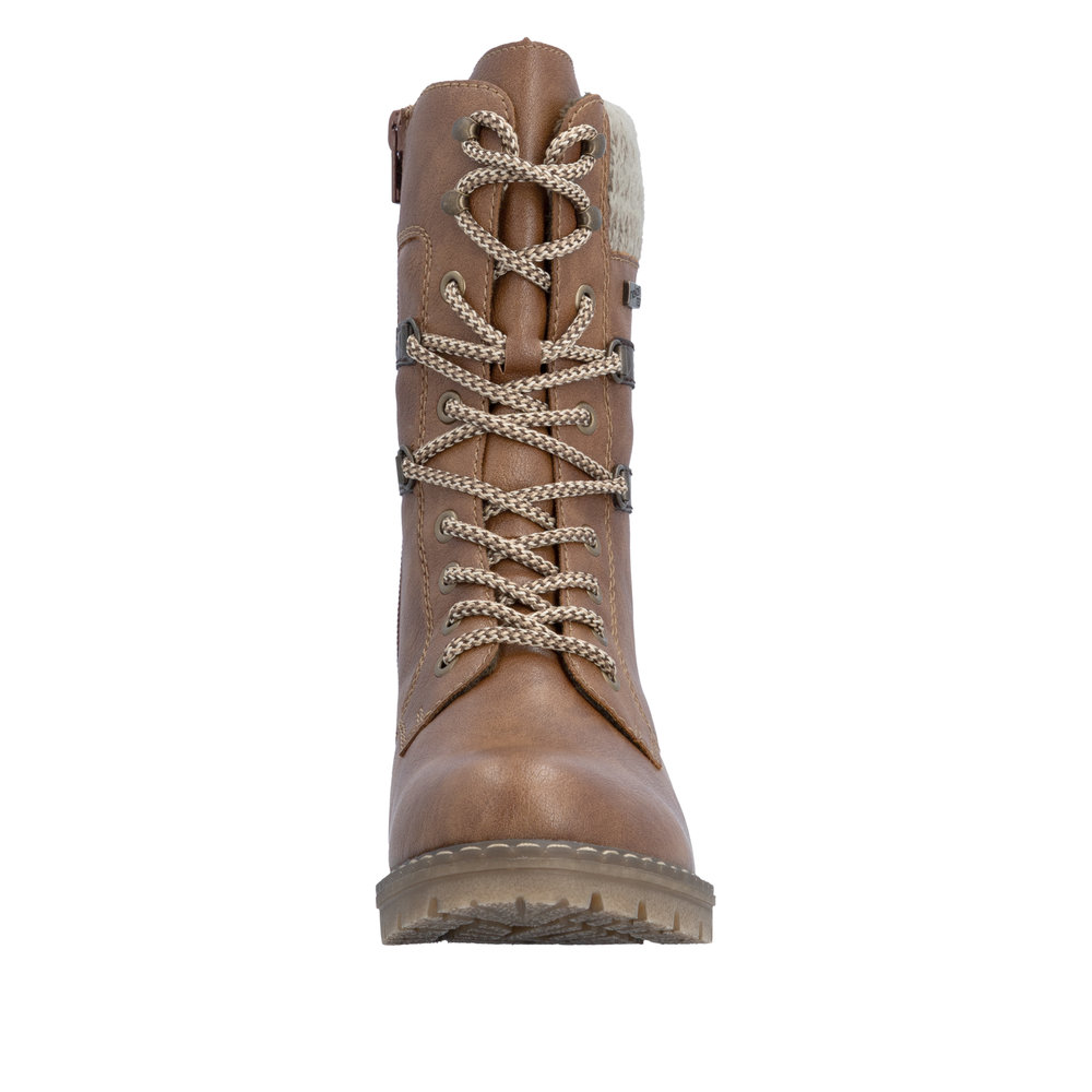 Boots femme Doublure chaude Lacets + zip Bottine dame faux cuir Talon décroché RIEKER Coloris marron camel. Vue de l'avant d'une chaussure gauche laissant apparaître le lacet.