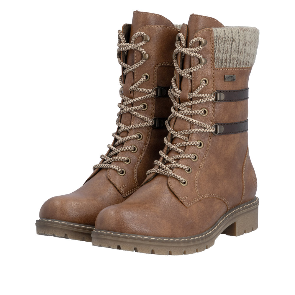 Boots femme Doublure chaude Lacets + zip Bottine dame faux cuir Talon décroché RIEKER Coloris marron camel. Vue d'ensemble de biais de deux chaussures laissant apparaître la mention "rieker tex".